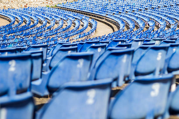 istock Blue seats in stadium, theatre 591833582