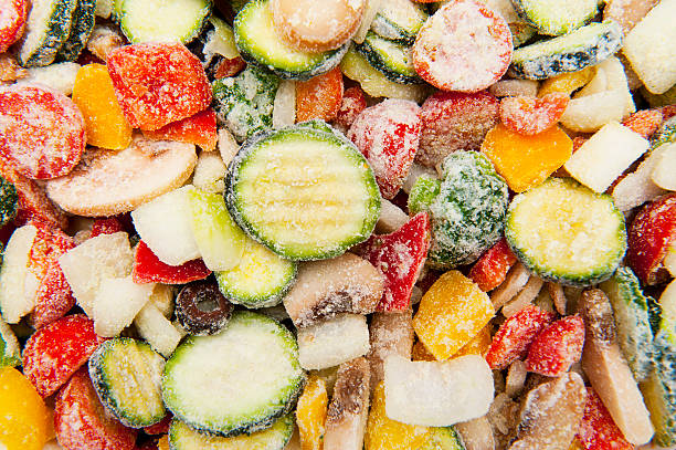 Frozen vegetables Close up of frozen vegetables frozen food stock pictures, royalty-free photos & images