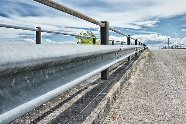 istock Street barrier - guardrail 591836754