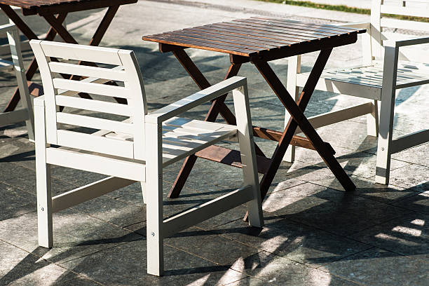 istock Wooden table and chairs outdoors 591837412