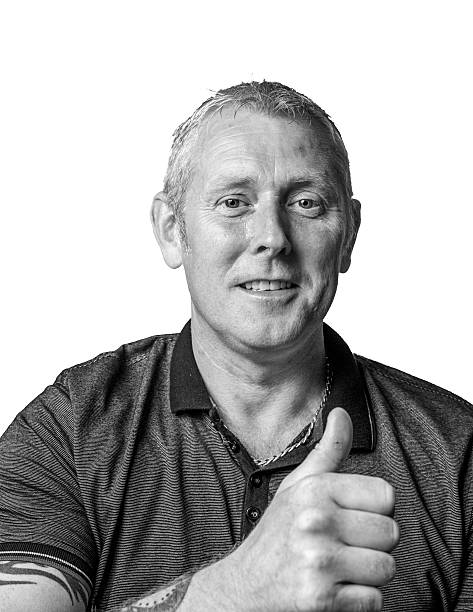 istock Mature man portrait thumbs up 591838262