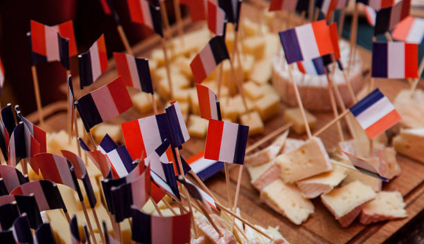 istock French cheeses with France flag 591838478