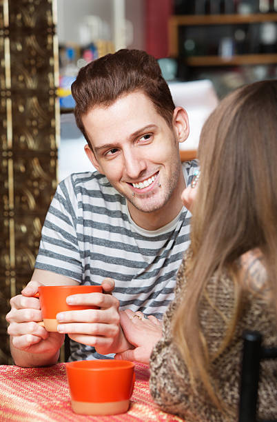 istock Smiling Man with Friend in Cafe 591840276
