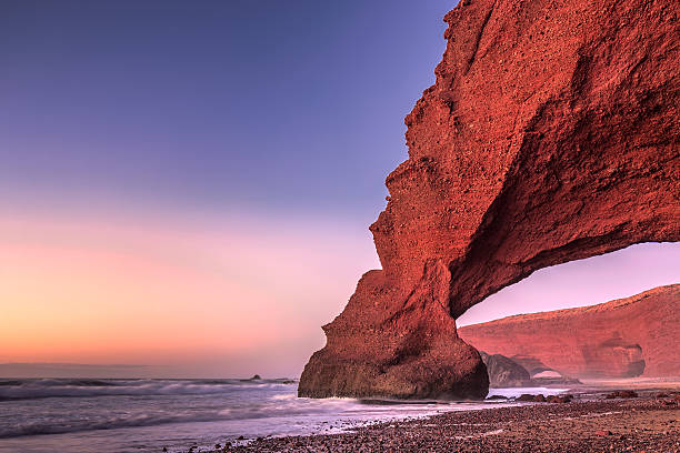 istock Red arches of Legzira beach 591844576