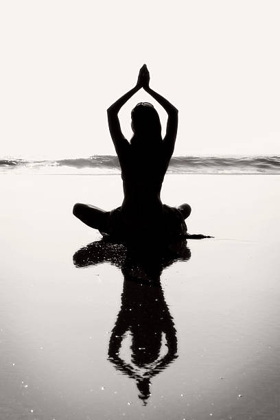 istock Young Woman Meditating 2 591845690
