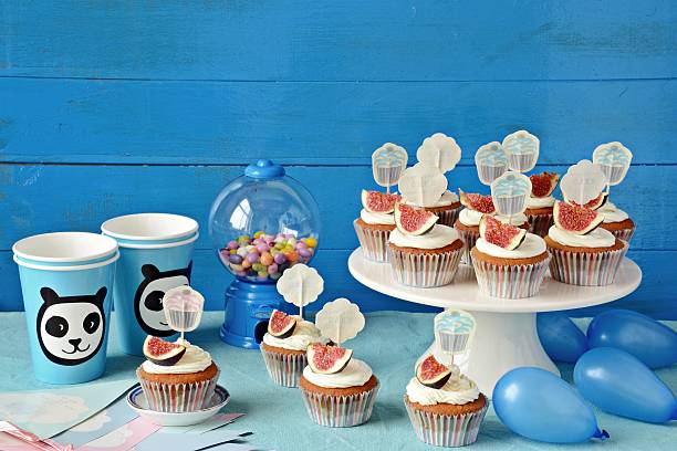 istock Candy-bar. Cupcakes on the blue background. Birthday party 591846190