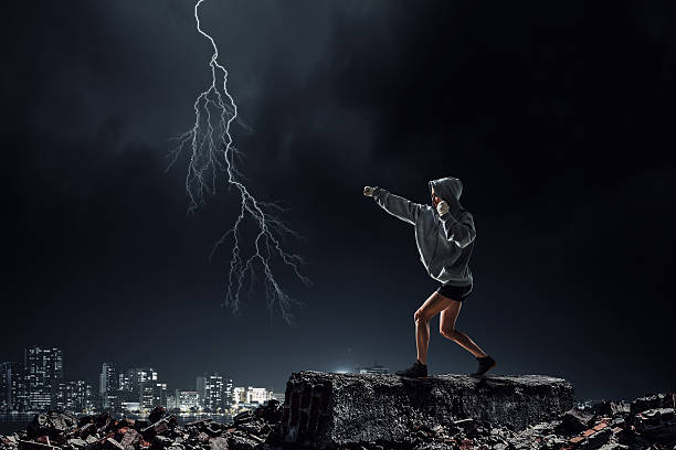 istock Young boxer woman training . Mixed media 591847770