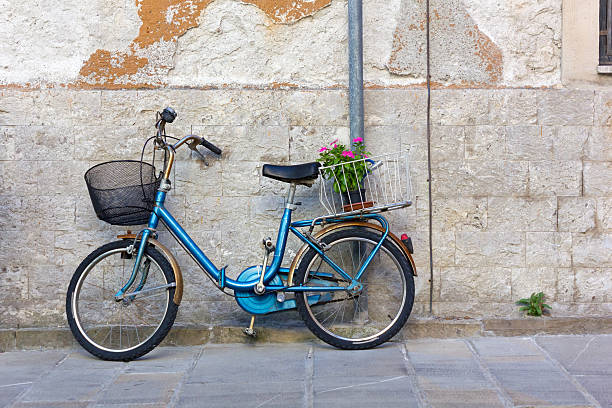 istock Blue Bicycle against an Exterior Wall 591848394