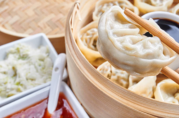 istock Steamed asian dumplings. Dumplings with fillings 591849886