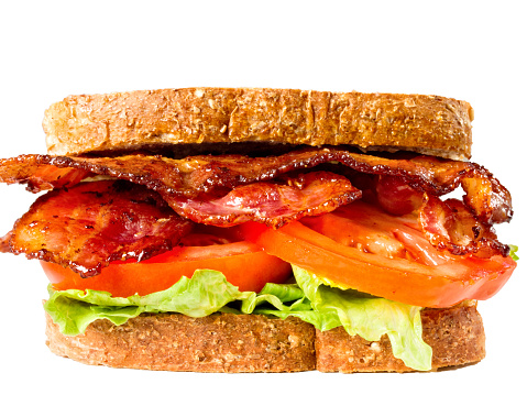 close up of juicy bacon lettuce and tomato sandwich