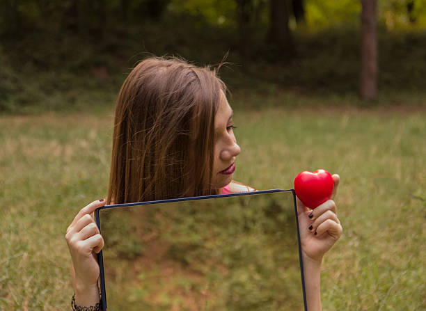 istock Girl in a park 591985724