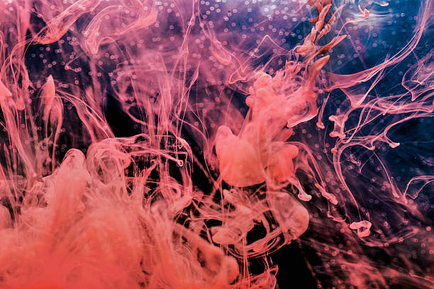 istock Pink paint in water 591985830