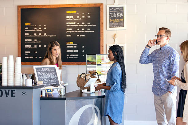 istock Diverse customers at a local coffee shop 591991128