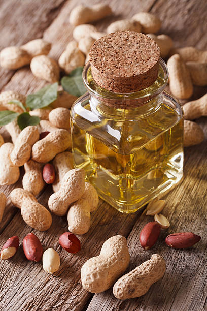 istock peanut oil in a glass jar on a table macro 591992690