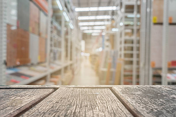 istock wood table top on store of material for construction 591993078