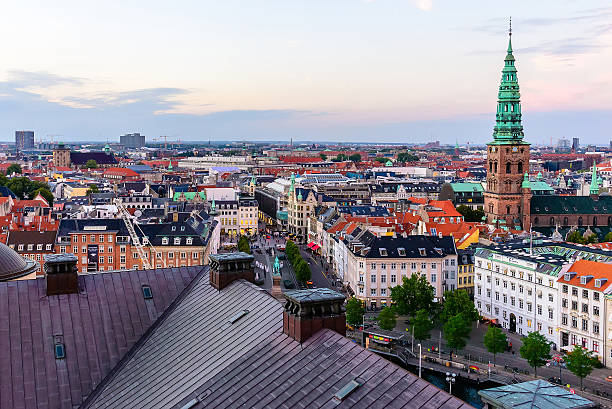 istock Panoramic view of evening Copenhagen roofs 591995752