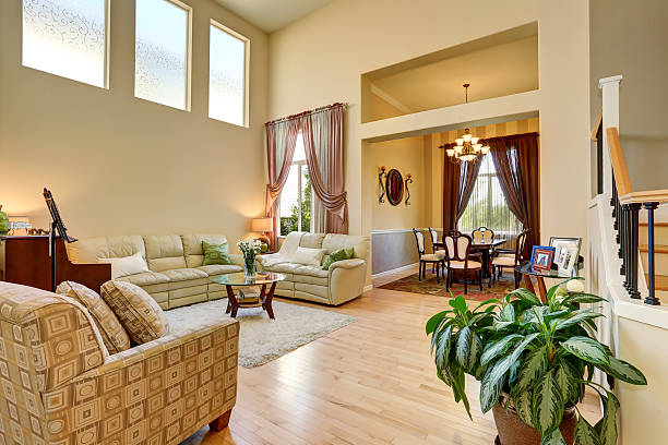 istock Cozy living room interior in light tones with leather sofas 591996828