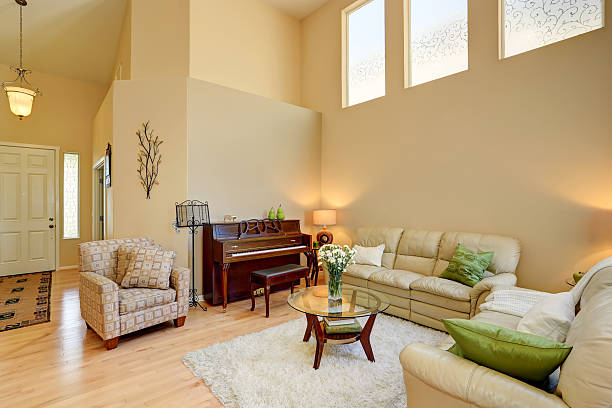 istock Cozy living room interior in light tones with leather sofas 591996924