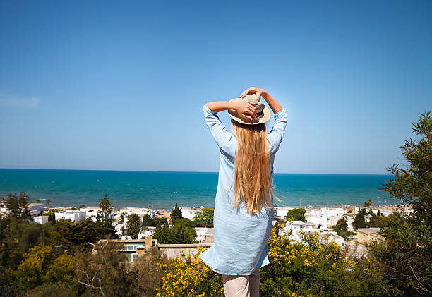 Young woman in Tunisia during hot summer day