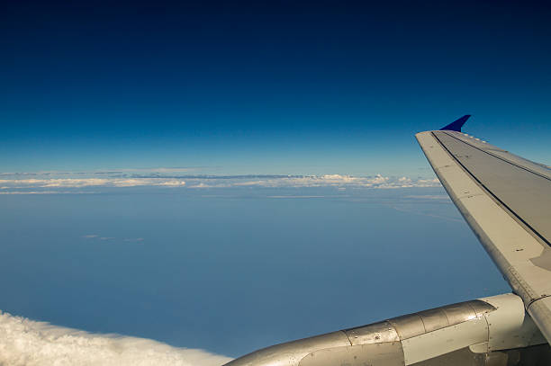 istock Aircraft point of view at clouds and wing 591998854