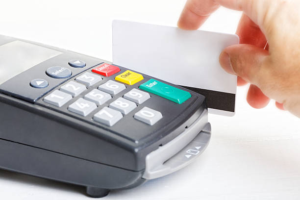 istock Payment terminal and mockup of plastic card 592002710