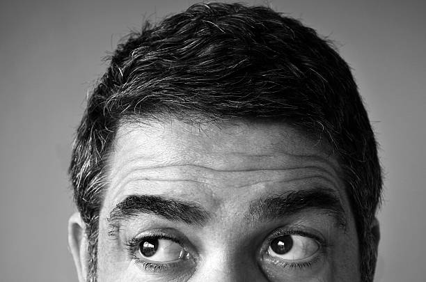 istock Eyes of a man looking for something 592003166