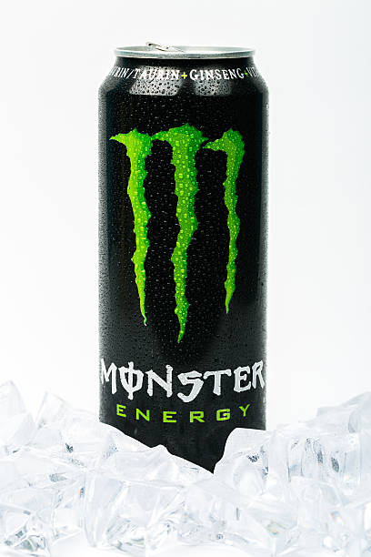 Can of Monster Energy Drink. Isolated on white background Trieste, Italy - August 19, 2016: A can of Monster Energy Drink. Introduced in 2002 Monster now has over 30 different drinks with high a caffeine content. monster energy stock pictures, royalty-free photos & images