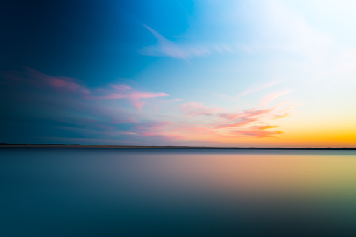 Abstract blurry dramatic Sunset in Long Exposure for background
