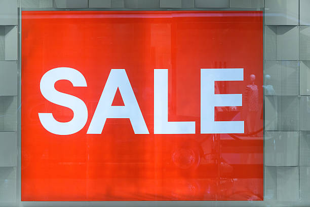 istock Red sale sign / banner inside  window display 592004574