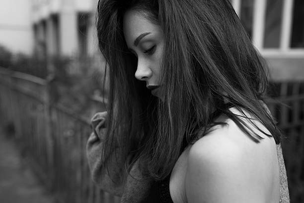 istock young beautiful girl posing on camera 592004710