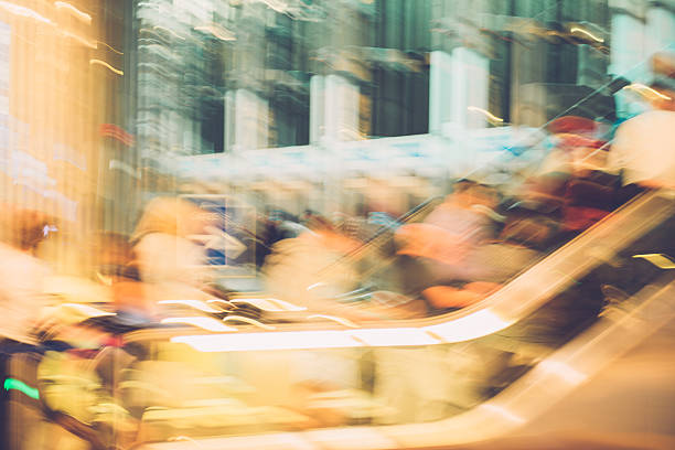 Large group of people ascending, indoors, Dubai, UEA. Unrecognizable people, copy space. Nikon D800, full frame, XXXL. iStockalypse Kyoto 2016 travel.