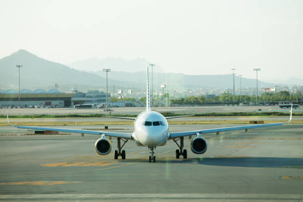 istock Plane in parking position on Barcelona airport 592008610