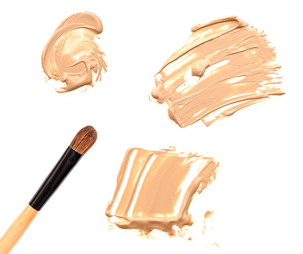 istock Foundation and make-up brush isolated on white 592014076
