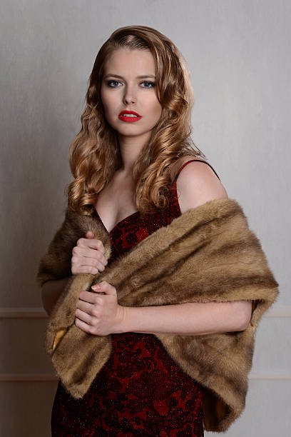 istock woman with fur wrap 1940s style 592018118