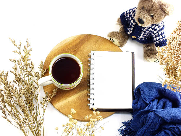 istock morning coffee mug notebook with dried flowers and scarf 592018182