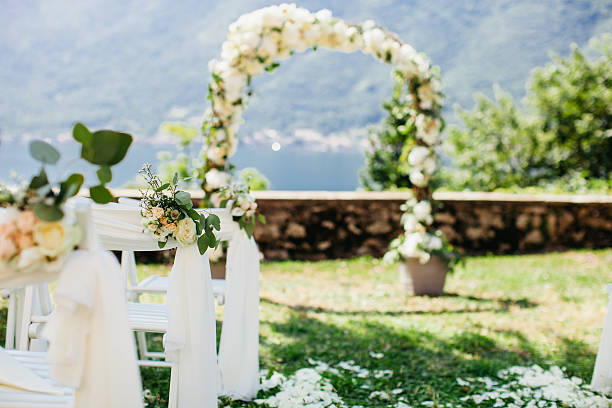 istock wedding chair cover with flowers decoration 592020306
