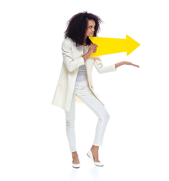 istock Woman presenting with arrow sign 592020450