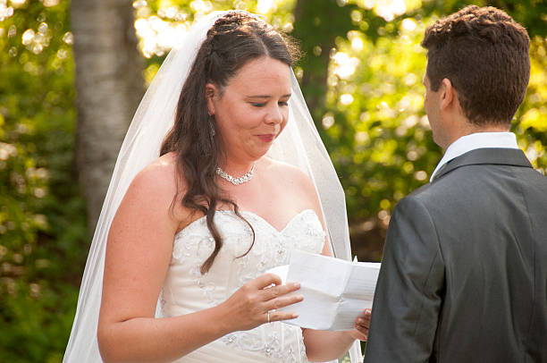 istock Bride reads vows to the groom 592021174