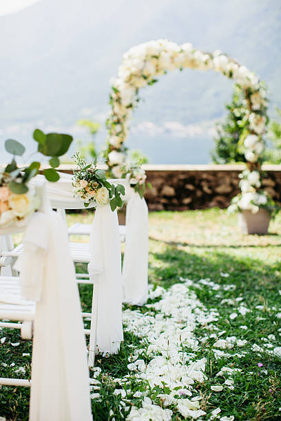 istock wedding chair cover with flowers decoration 592022478