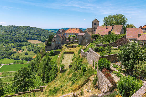 View of the picturesque medieval village in valley View of the picturesque medieval village in valley. Chalon, Departement Jura, Franche-Comte, France franche comte photos stock pictures, royalty-free photos & images