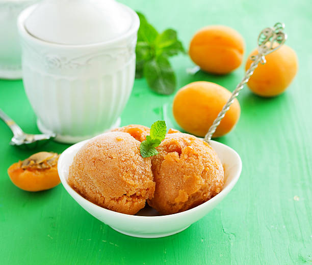 istock Apricot peach ice cream and pieces, 592025986
