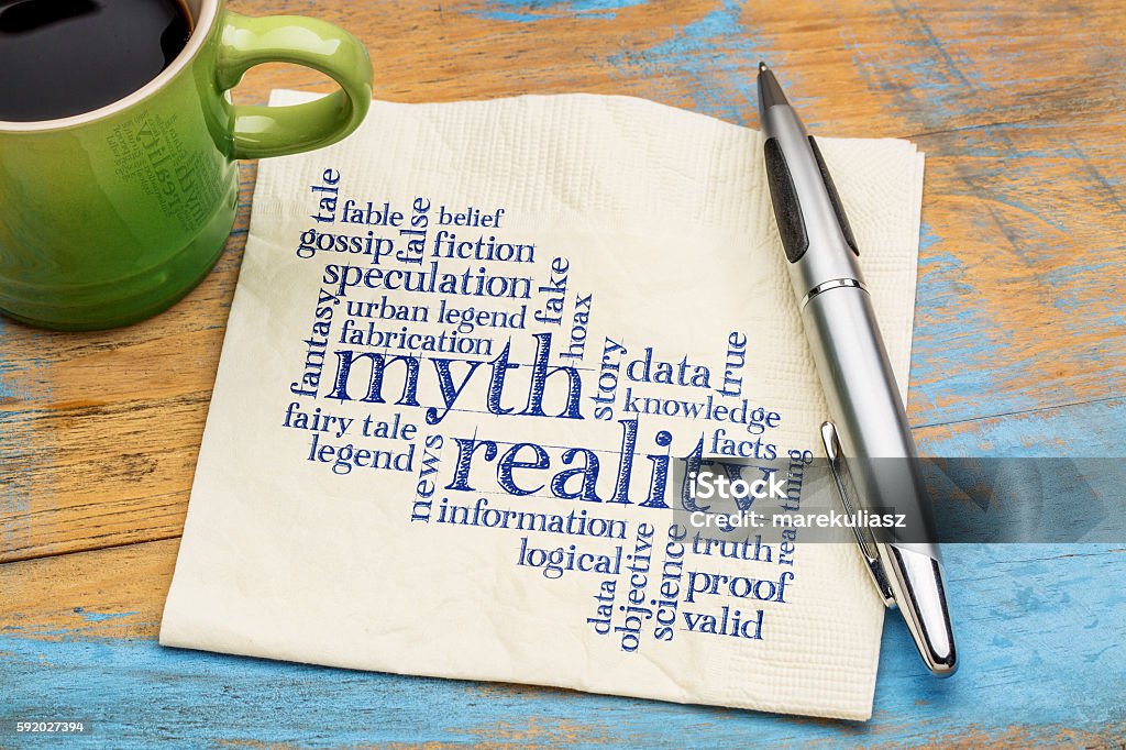 myth and reality word cloud myth versus reality word cloud - handwriting on a napkin with cup of coffee Mythology Stock Photo