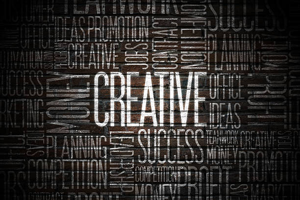Creative word on brick wall business strategy concept.