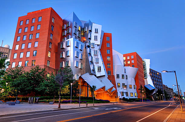 Stata Center MIT Cambridge, Massachusetts, USA - June 11, 2016: Night view of  MIT's Ray and Maria Stata Center along Vassar street in the Area 2 neighborhood of Cambridge cambridge massachusetts stock pictures, royalty-free photos & images