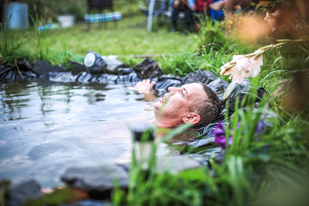 istock In the summer, bright sunny day, happy man is bathed 592032306