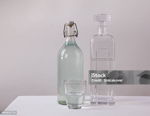 Clean And Dirty Drinking Waterconcept Stock Photo - Download Image Now - Bottle, Drinking Glass, Glass - Material