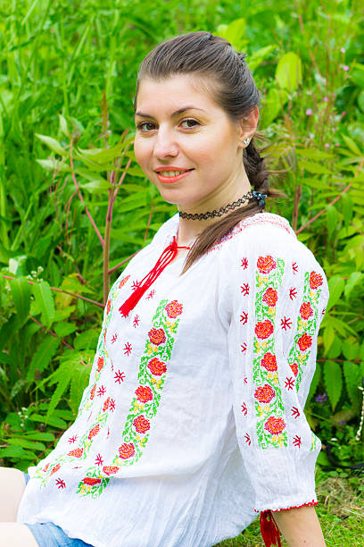 istock Girl in traditional Romanian blouse 592034044