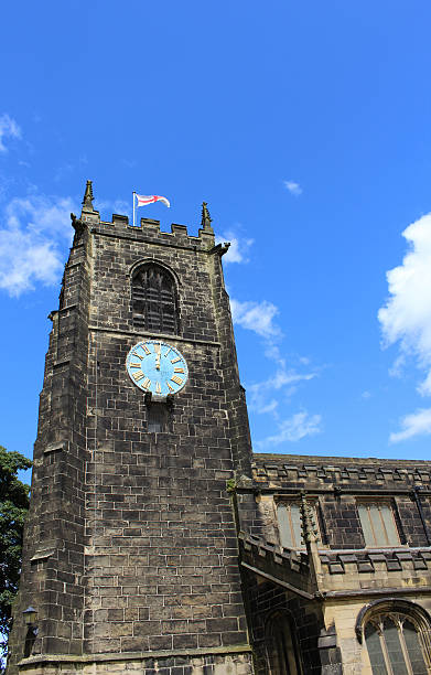 istock Almondbury Village Methodist Church clock tower 592358368