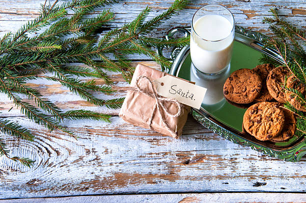 istock Milk, cookies and some gift for Santa 592359060