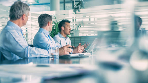 istock Manager's meeting in a modern board room 592359508